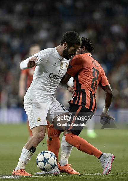 Isco of Real Madrid vies with Fred of Shakhtar Donetsk during the UEFA Champions League Group A football match between Real Madrid and Shaktar...