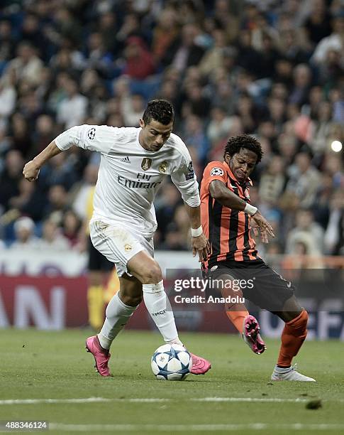 Cristiano Ronaldo of Real Madrid vies with Fred of Shakhtar Donetsk during the UEFA Champions League Group A football match between Real Madrid and...