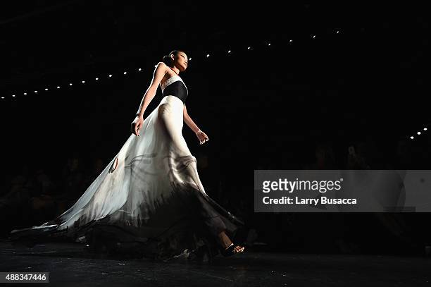 Model walks the runway at Carmen Marc Valvo seen around Skylight at Moynihan Station during Spring 2016 New York Fashion Week: The Shows on September...