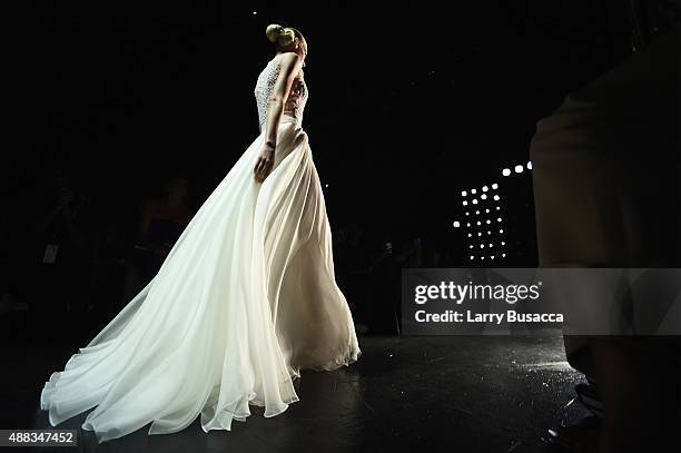 Model walks the runway at Carmen Marc Valvo seen around Skylight at Moynihan Station during Spring 2016 New York Fashion Week: The Shows on September...