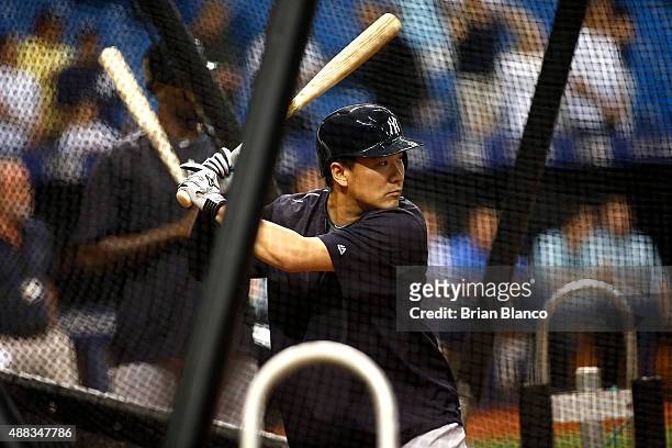 Pitcher Masahiro Tanaka of the New York Yankees takes batting practice before the start of a game against the Tampa Bay Rays on September 15, 2015 at...