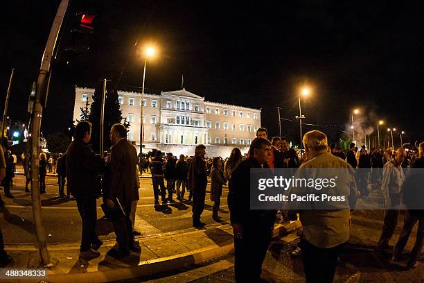 Street market vendors from all over Greece gather in Syntagma Square in front of the Greek Parliament, demanding that the Government votes against a...