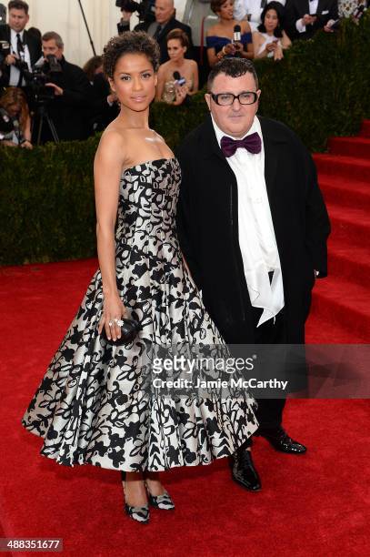 Gugu Mbatha-Raw and Alber Elbaz attend the "Charles James: Beyond Fashion" Costume Institute Gala at the Metropolitan Museum of Art on May 5, 2014 in...