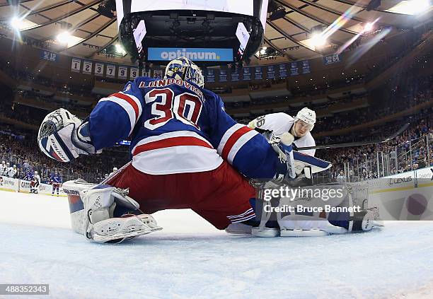 Jussi Jokinen of the Pittsburgh Penguins shoots the puck past Henrik Lundqvist of the New York Rangers for a second period goal in Game Three of the...