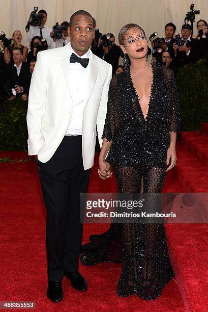Jay-Z; Beyonce Knowles attends the "Charles James: Beyond Fashion" Costume Institute Gala at the Metropolitan Museum of Art on May 5, 2014 in New...