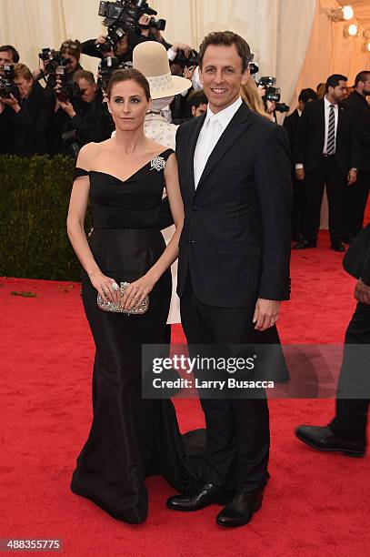 Alexi Ashe and Seth Meyers attend the "Charles James: Beyond Fashion" Costume Institute Gala at the Metropolitan Museum of Art on May 5, 2014 in New...