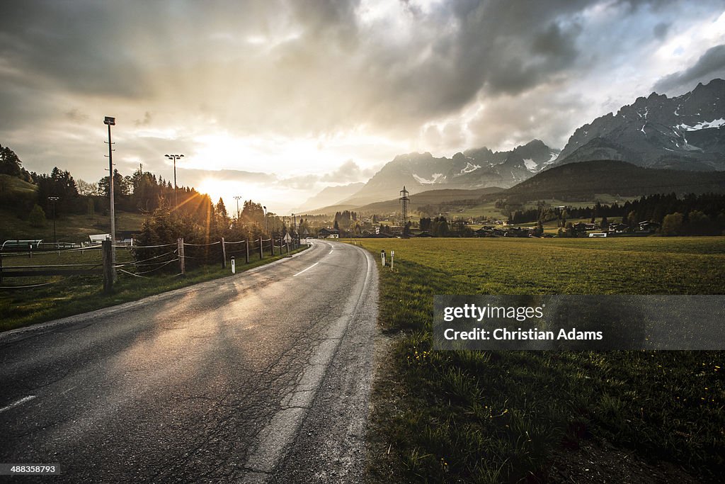 Mountain road at sunset