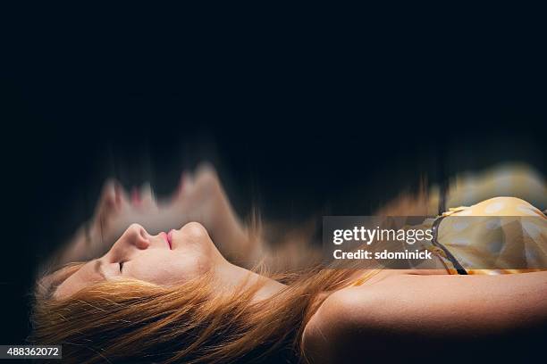 sleeping woman having a nightmare - dead women stock pictures, royalty-free photos & images