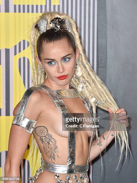 Miley Cyrus arrives to the 2015 MTV Video Music Awards at Microsoft Theater on August 30, 2015 in Los Angeles, California.