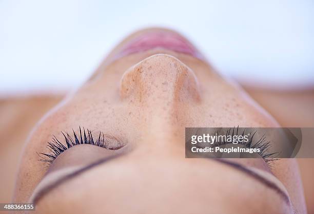 she's in a deeply relaxed state of mind - beauty stock pictures, royalty-free photos & images