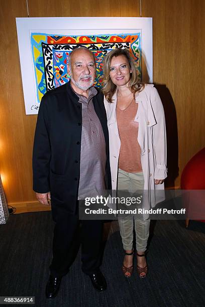 Artist Tahar Ben Jelloun and Valerie Trierweiler attend the 'Paintings Poems from Tahar Ben Jelloun - Furniture Scriptures from C.Saccomanno &...