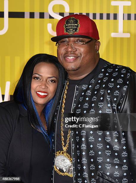 Tracy Evans and rapper E-40 attend the 2015 MTV Video Music Awards at Microsoft Theater on August 30, 2015 in Los Angeles, California.