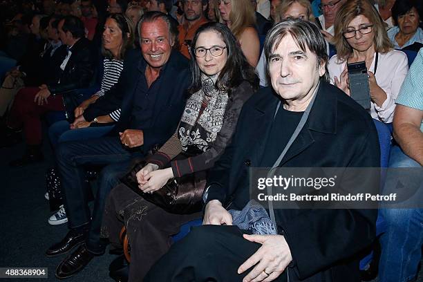 Humorist Michel Leeb, Guest and Singer Serge Lama attend the Concert of singer Charles Aznavour at Palais des Sports on September 15, 2015 in Paris,...