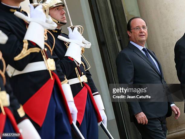 French President Francois Hollande arrives at the State Dinner honoring Japanese Prime Minister at Elysee Palace on May 5, 2014 in Paris, France....