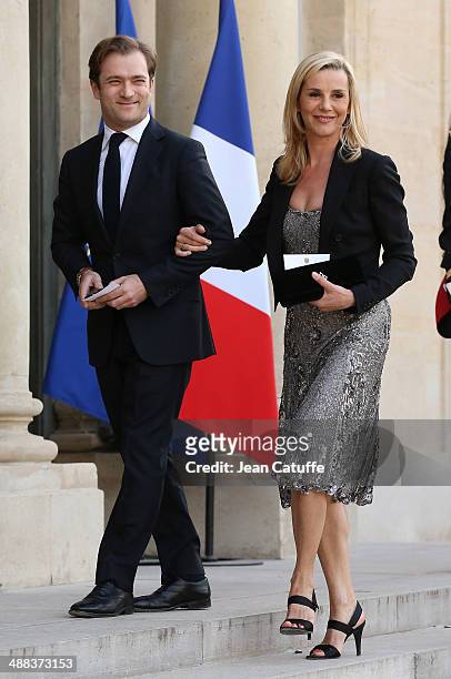 Laurence Ferrari and husband Renaud Capucon arrive at the State Dinner honoring Japanese Prime Minister at Elysee Palace on May 5, 2014 in Paris,...