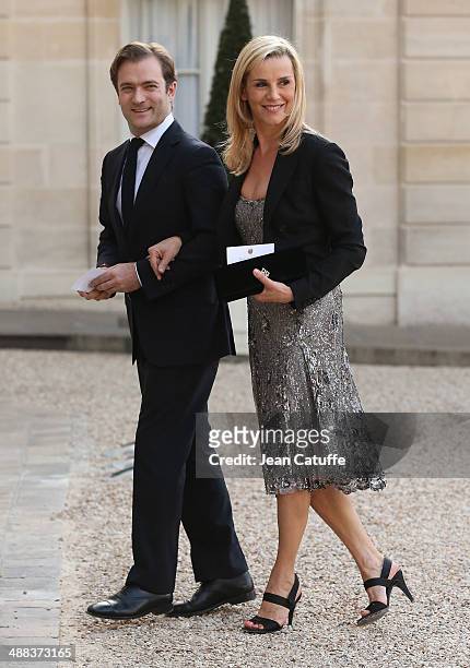 Laurence Ferrari and husband Renaud Capucon arrive at the State Dinner honoring Japanese Prime Minister at Elysee Palace on May 5, 2014 in Paris,...