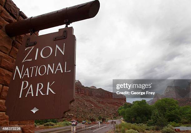 Cars enter Zion's National Park on September 15, 2015 in Springdale, Utah. Four hikers died and three are missing after a flash flood yesterday that...