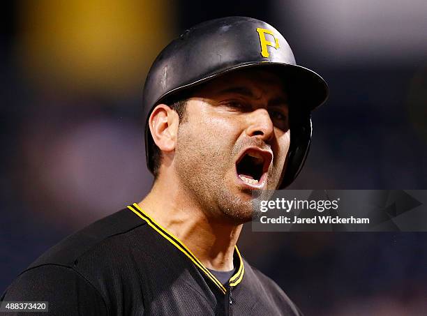 Francisco Cervelli of the Pittsburgh Pirates reacts after striking out to end the game against the Chicago Cubs during game two of the doubleheader...