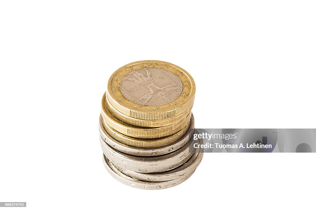 Stack of Euro coins isolated on white background