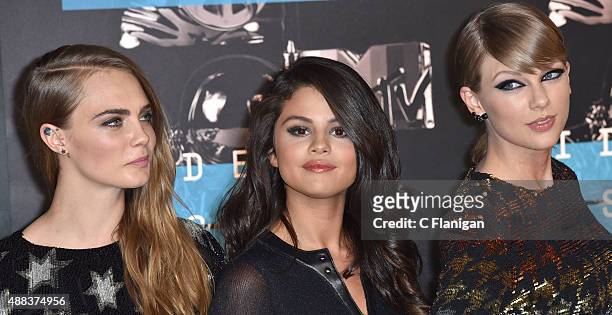 Model Cara Delevingne, recording artists Selena Gomez and Taylor Swift arrive to the 2015 MTV Video Music Awards at Microsoft Theater on August 30,...