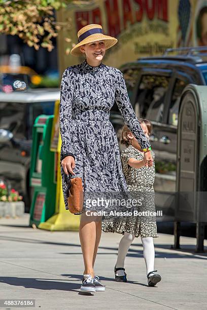 Leelee Sobieski and daughter Louisanna Ray Kimmel are seen taking casual stroll on Upper East Side on September 15, 2015 in New York City.