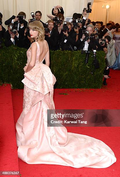 Taylor Swift attends the "Charles James: Beyond Fashion" Costume Institute Gala held at the Metropolitan Museum of Art on May 5, 2014 in New York...