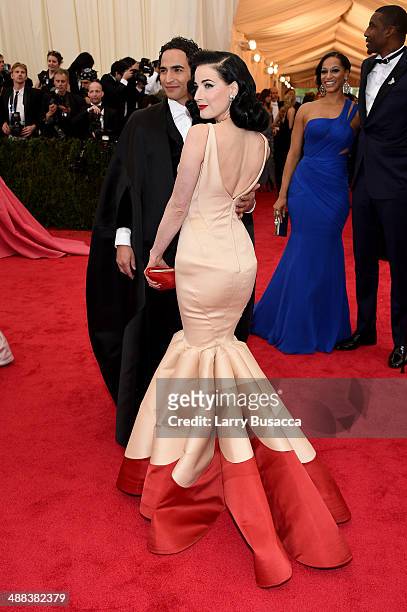 Designer Zac Posen and Dita Von Teese attend the "Charles James: Beyond Fashion" Costume Institute Gala at the Metropolitan Museum of Art on May 5,...