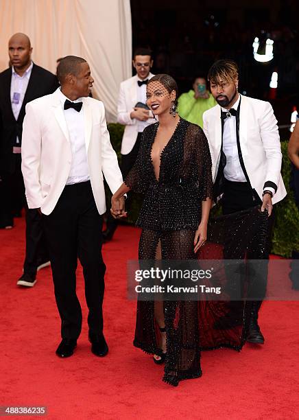 Jay-Z and Beyonce attend the "Charles James: Beyond Fashion" Costume Institute Gala held at the Metropolitan Museum of Art on May 5, 2014 in New York...