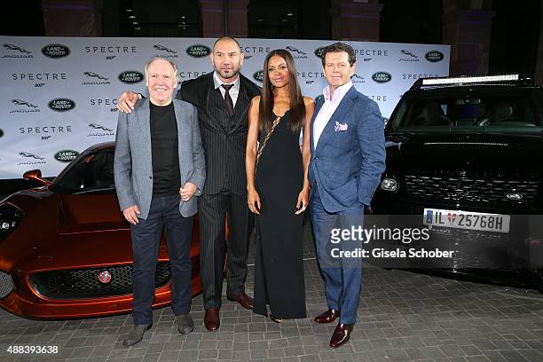 Ian Callum , Dave Bautista , Naomie Harris and Gerry McGovern during the presentation of the Jaguar Land Rover vehicles starring in the new Bond film...