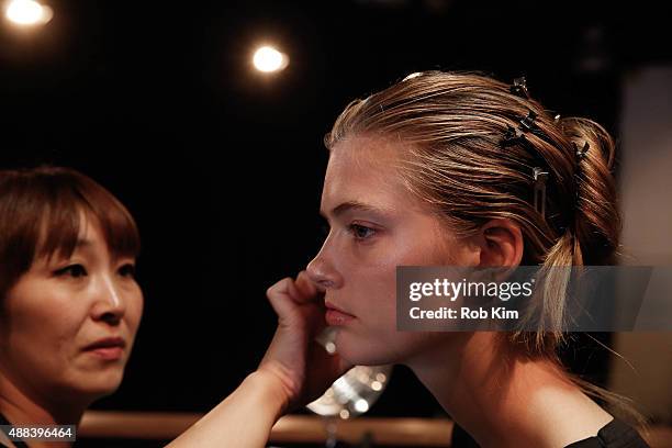 Models prepare backstage before the Narciso Rodriguez fashion show during Spring 2016 New York Fashion Week at SIR Stage37 on September 15, 2015 in...