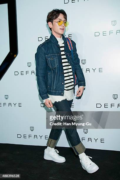 Key of South Korean boy band SHINee attends the launch party for DEFAYE flagship store on September 15, 2015 in Seoul, South Korea.