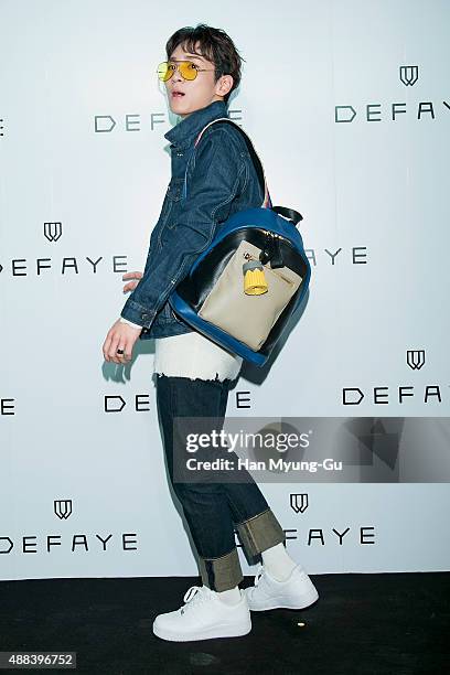 Key of South Korean boy band SHINee attends the launch party for DEFAYE flagship store on September 15, 2015 in Seoul, South Korea.