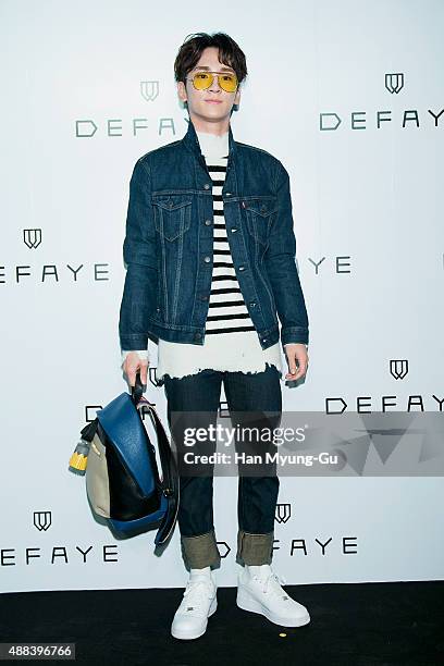 Key of South Korean boy band SHINee attends the launch party for DEFAYE flagship store on September 15, 2015 in Seoul, South Korea.