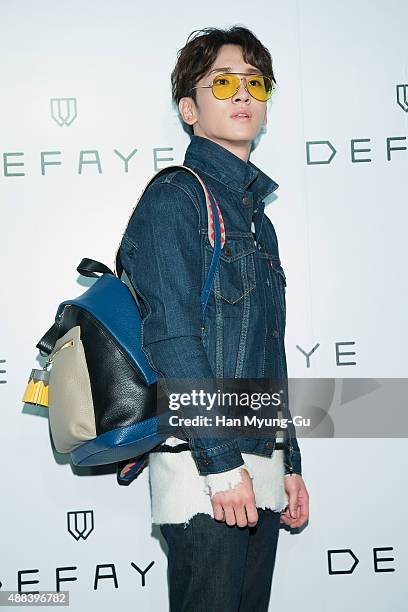 Key of South Korean boy band SHINee attends the launch party for DEFAYE flagship store on September 15, 2015 in Seoul, South Korea.