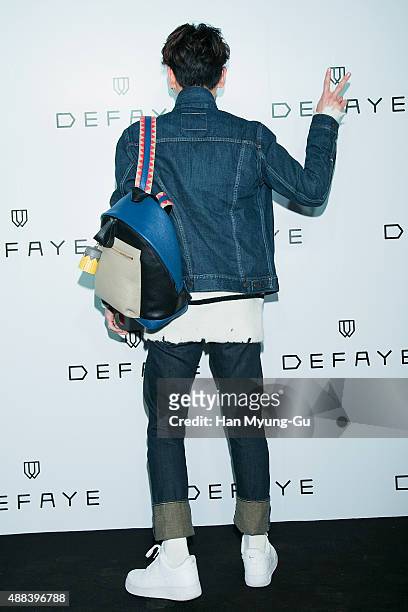 Key of South Korean boy band SHINee attends the launch party for DEFAYE flagship store on September 15, 2015 in Seoul, South Korea.