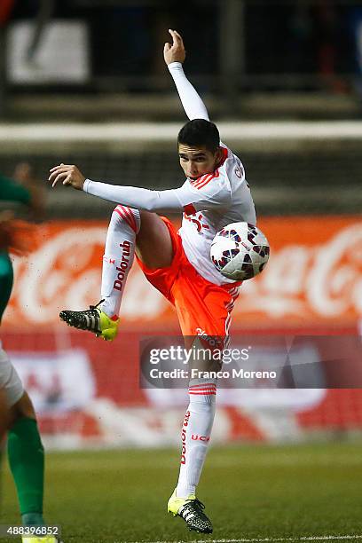 Sebastian Martinez of U de Chile kicks the ball during a match between Audax Italiano and U de Chile as part of 6th round of Torneo Apertura 2015 at...