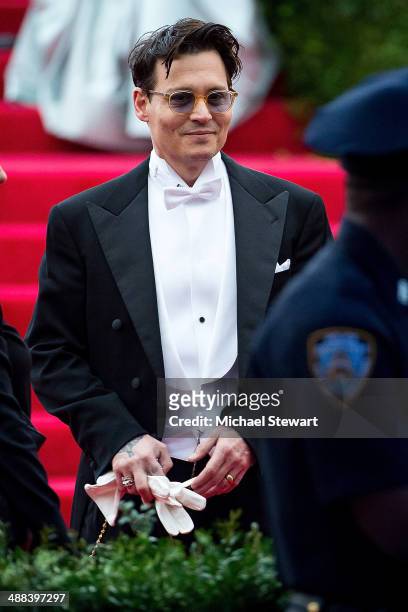 Actor Johnny Depp attends the "Charles James: Beyond Fashion" Costume Institute Gala at the Metropolitan Museum of Art on May 5, 2014 in New York...