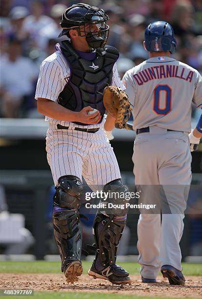 Catcher Michael McKenry of the Colorado Rockies backs up the plate against the New York Mets at Coors Field on May 4, 2014 in Denver, Colorado. The...