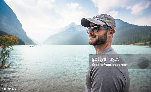 lake louise in banff national park - canada - man hat stock pictures, royalty-free photos & images