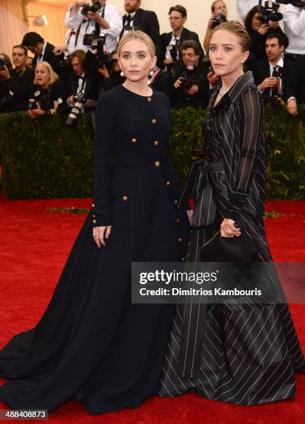 Ashley Olsen and Mary-Kate Olsen attend the "Charles James: Beyond Fashion" Costume Institute Gala at the Metropolitan Museum of Art on May 5, 2014...