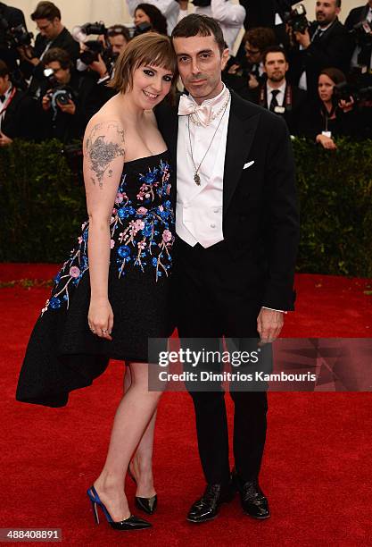 Lena Dunham and Giambattista Valli attend the "Charles James: Beyond Fashion" Costume Institute Gala at the Metropolitan Museum of Art on May 5, 2014...