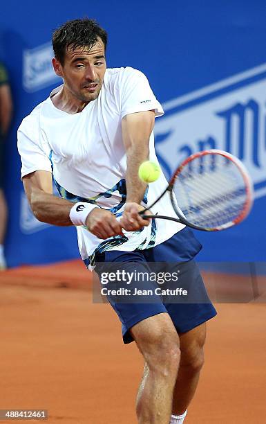 Ivan Dodig of Croatia in action against Rafael Nadal of Spain during day four of the ATP Tour Open Banc Sabadell Barcelona 2014, 62nd Trofeo Conde de...