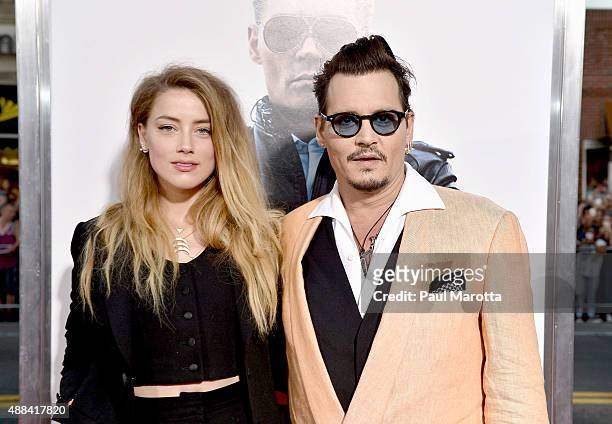 Actors Amber Heard and Johnny Depp attend the "Black Mass" Boston special screening at the Coolidge Corner Theatre on September 15, 2015 in Boston,...