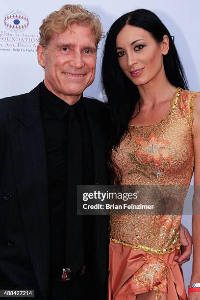 Robert Huizenga and Regina Salpagarova at The Brent Shapiro Foundation's Summer Spectacular on September 12, 2015 in Beverly Hills, California.