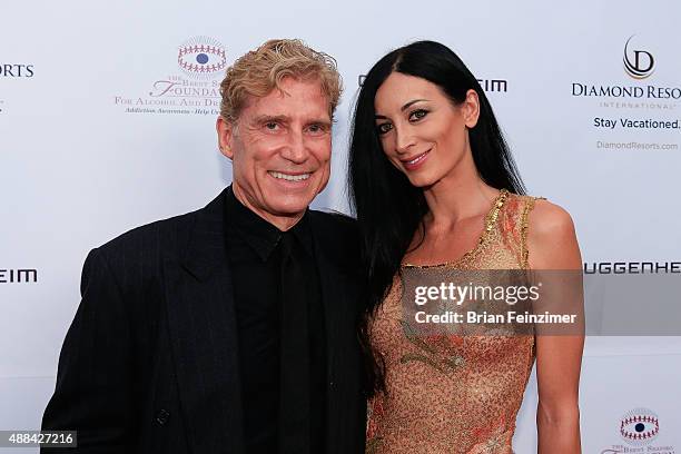 Robert Huizenga and Regina Salpagarova at The Brent Shapiro Foundation's Summer Spectacular on September 12, 2015 in Beverly Hills, California.