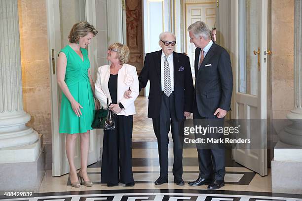 Queen Mathilde of Belgium, Madame Thielemans, Baron Toots Thielemans and King Pilippe of Belgium pose for a picture at Laeken Castle on May 6, 2014...