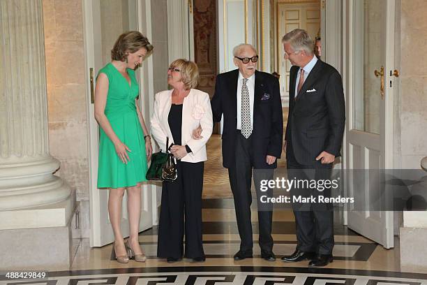 Queen Mathilde of Belgium, Madame Thielemans, Baron Toots Thielemans and King Pilippe of Belgium pose for a picture at Laeken Castle on May 6, 2014...