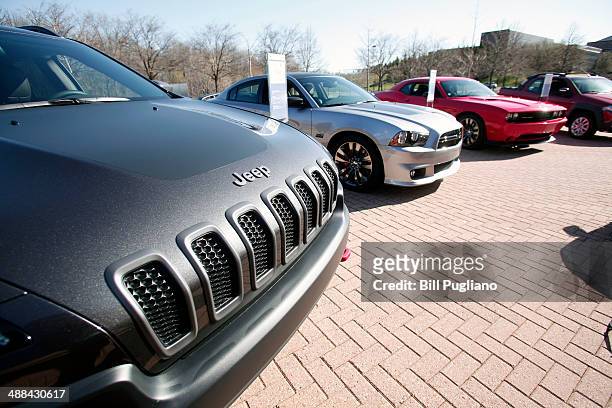 The grill of an FCA Jeep Cherokee Trailhawk is shown outside the Chrysler Group complex May 6, 2014 in Auburn Hills, Michigan. On Tuesday Fiat...