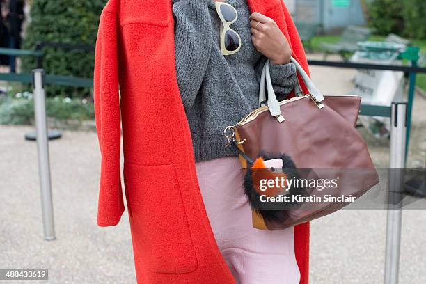 Guest wears a Fendi Monster on day 6 of Paris Collections: Women on March 02, 2014 in Paris, France.