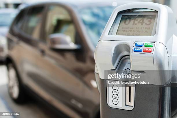 electronic/digital parking meter with time left - parking meter stock pictures, royalty-free photos & images
